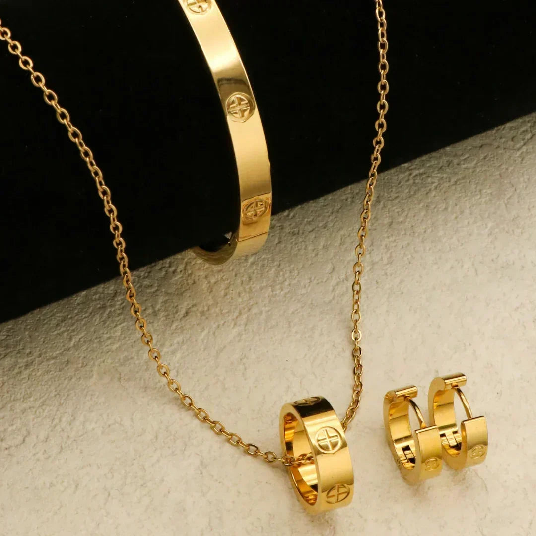 Conjunto Collar, Pulsera y Pendientes Dorados